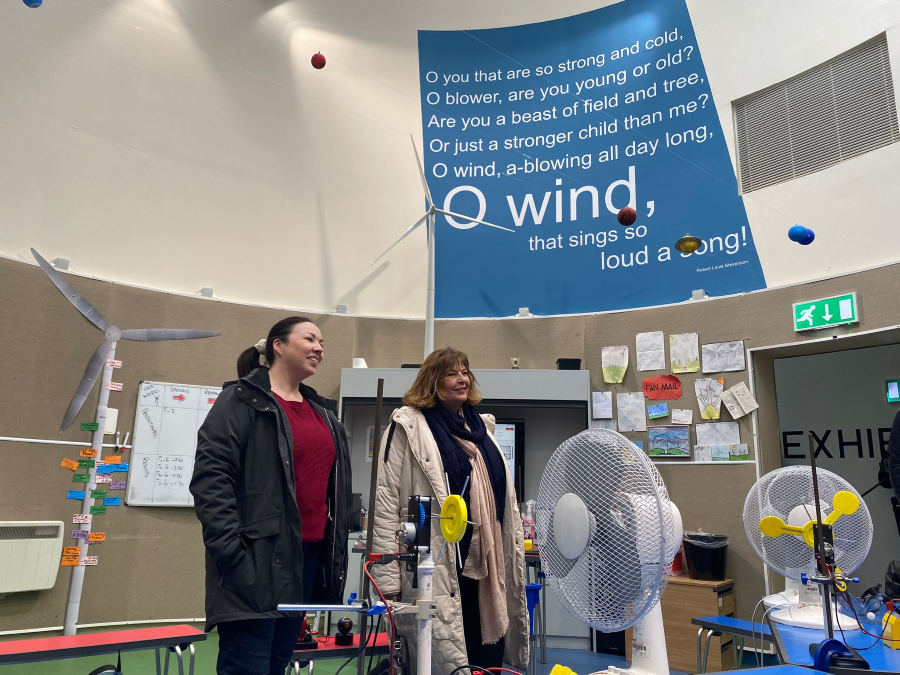 MSPs pose for a photograph in Whitelee visitor centre.
